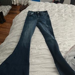 I am selling dark wash flare jeans
